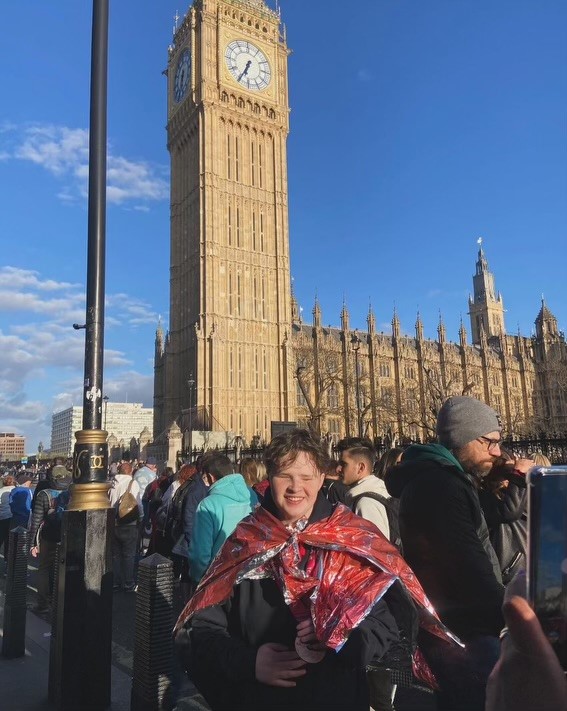 Tilly in front of Big Ben after running the marathon