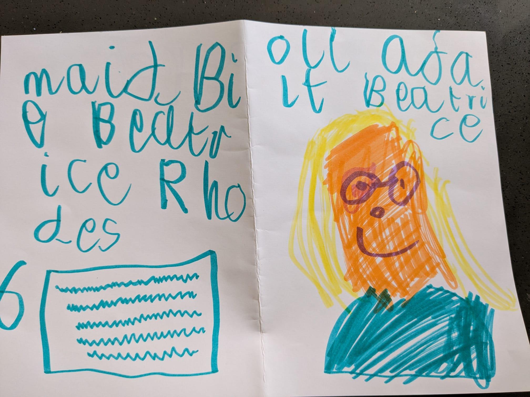 A drawing of a girl with blonde hair.