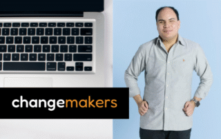 Changemakers. A professional headshot of Robin, a man in a light grey shirt.