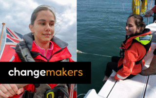 Changemaker Zehra in a red life jacket sailing a boat.
