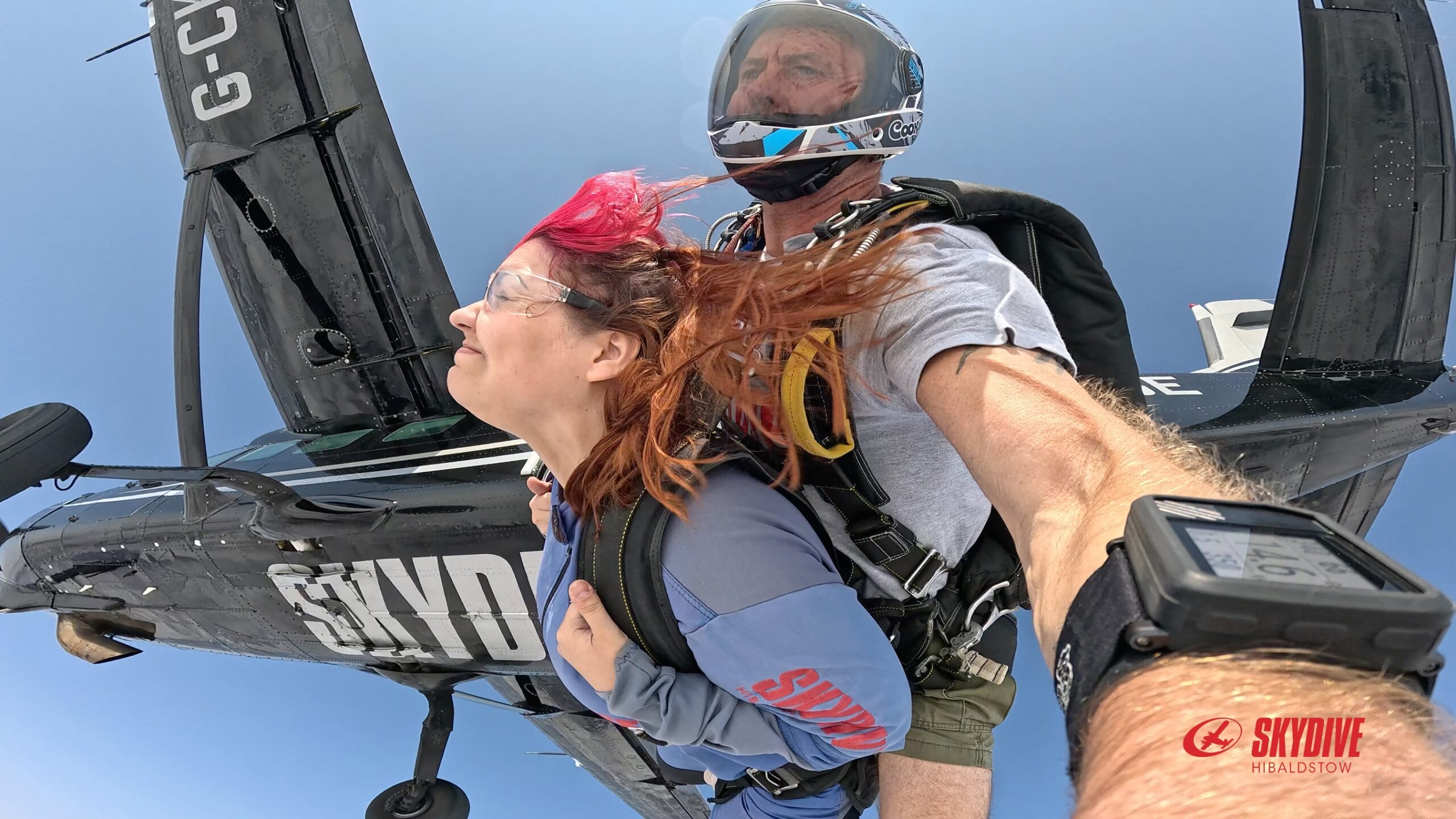 Skydive 3 Millie smiling with joy as she falls through the air.